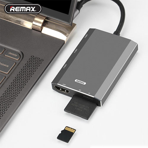 Remax 6 in 1 Type-C Docking Station 2 x USB 3.0 1 x SD Card Slot 1 x Type C 1 x HDMI Port Remax 6 in 1 Type-C Docking Station 2 x USB 3.0 1 x SD Card Slot 1 x Type C 1 x HDMI Port